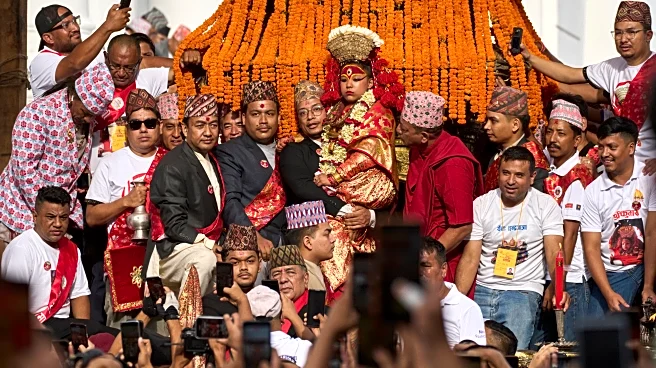 See Nepal's living goddess leave her palace to bless throngs of worshipers