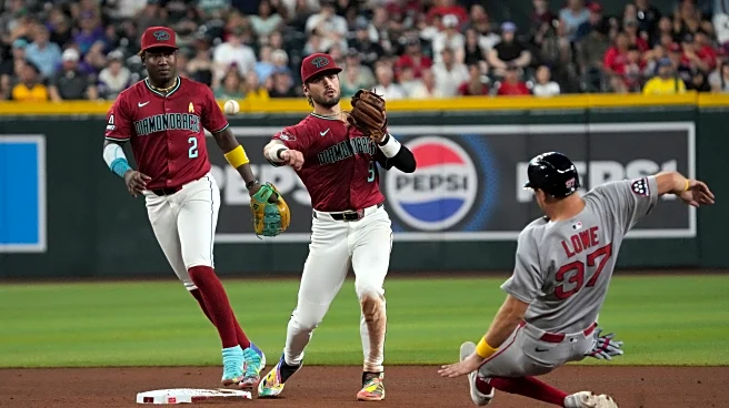 Cora gets 600th win with Red Sox, Sogard hits 2-run double in 9th of 7-4 win over Diamondbacks
