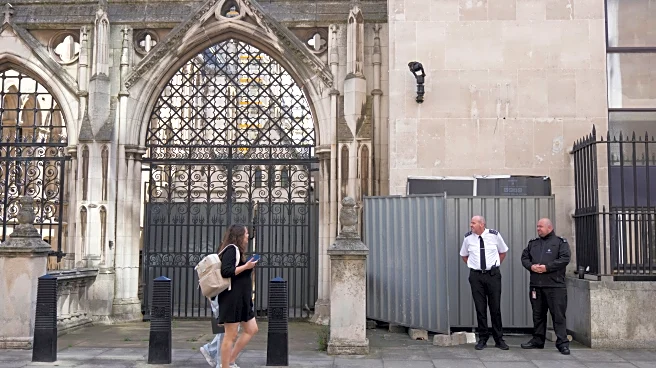 Banksy unveils a new mural of a judge beating a protester outside London court
