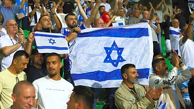 Israel soccer coach 'standing behind my country' amid calls for squad to be suspended