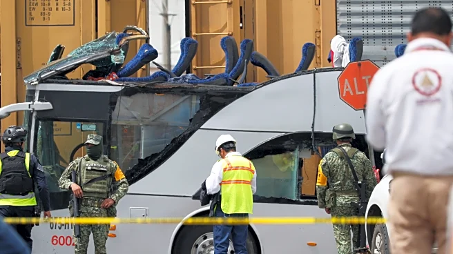 Freight train slams into a bus outside Mexico City and kills at least 8 people
