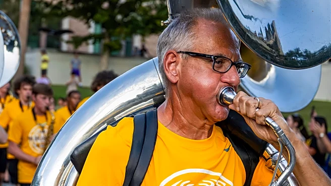 Retired accountant is hitting a high note: He's joined Louisiana State University's marching band