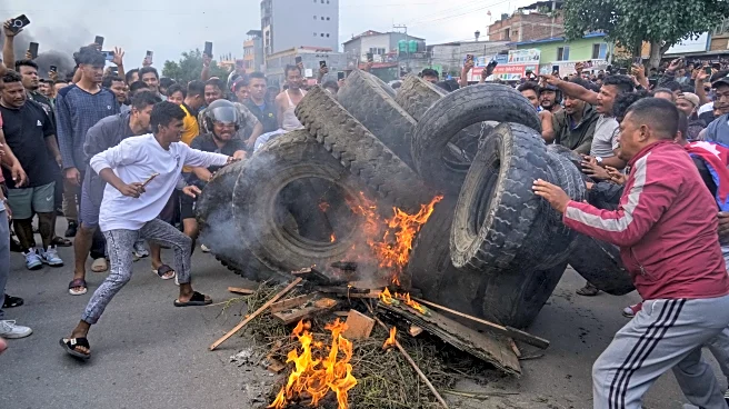 Nepal political leaders' homes set on fire as protests over retracted social media ban grow