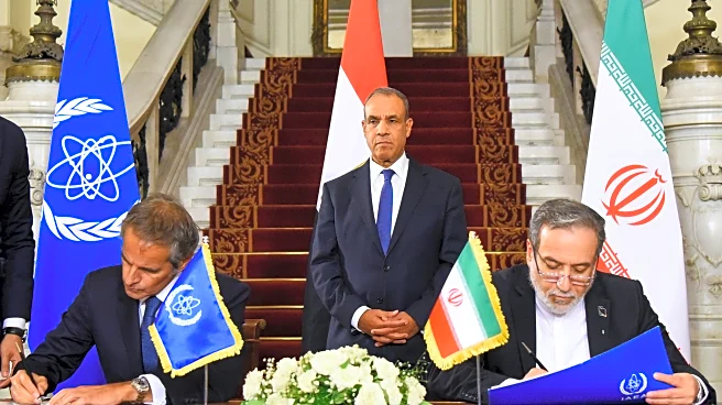 Iran and nuclear watchdog sign agreement seeking path to restart cooperation