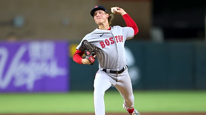 Early strikes out 11, tying Red Sox record for debut, Boston tops A's 6-0 to close on Yankees