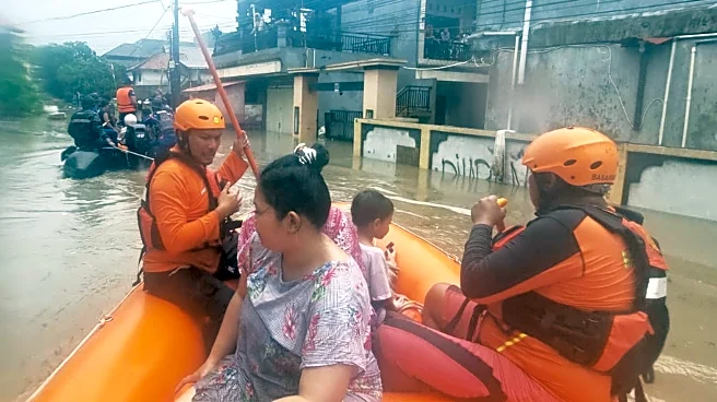 Flash floods in Indonesia leave at least 11 dead and 13 missing