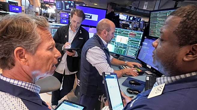 Wall Street ticks toward more records as inflation slows and Oracle soars