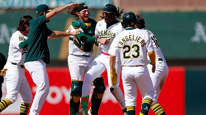 Kurtz, Butler power A's past Red Sox 5-4, end Chapman's hitless streak of 50 batters, 17 appearances