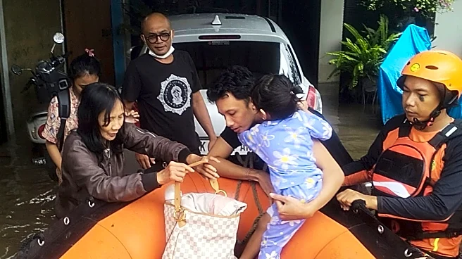 Indonesian rescuers search for missing people as floods recede