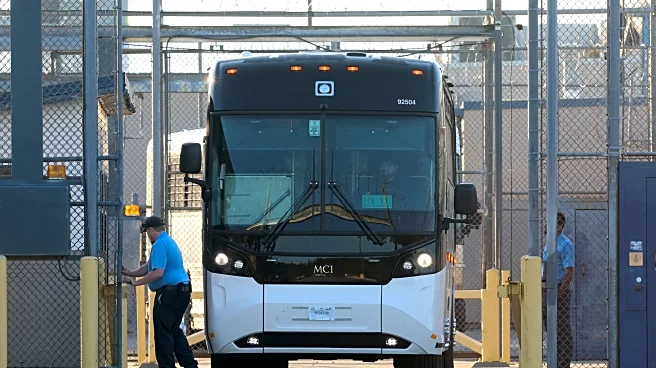 Korean workers detained in immigration raid bound for Atlanta and flight back home