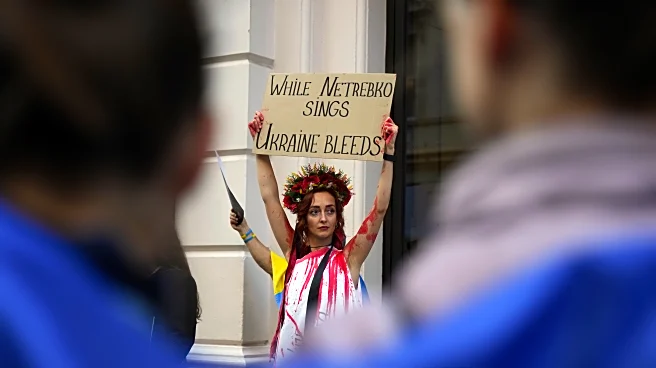 Royal Opera appearance by Russian soprano Anna Netrebko draws pro-Ukraine demonstration