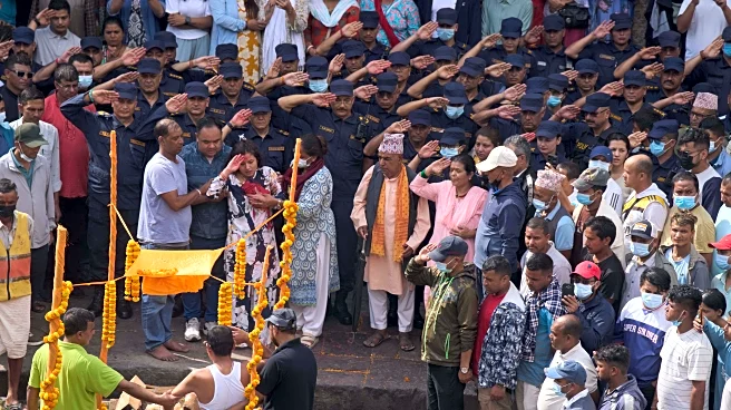 Nepal's president appoints former chief justice as interim premier and first woman leader