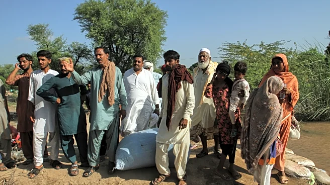 Floodwaters begin receding in a major Pakistani city but nearby towns face evacuations