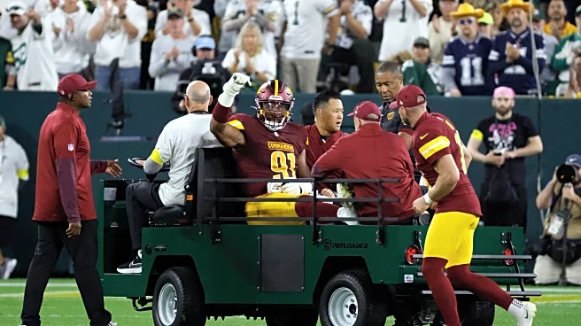 Commanders' Wise is out for the season and team believes Ekeler tore his Achilles, AP source says
