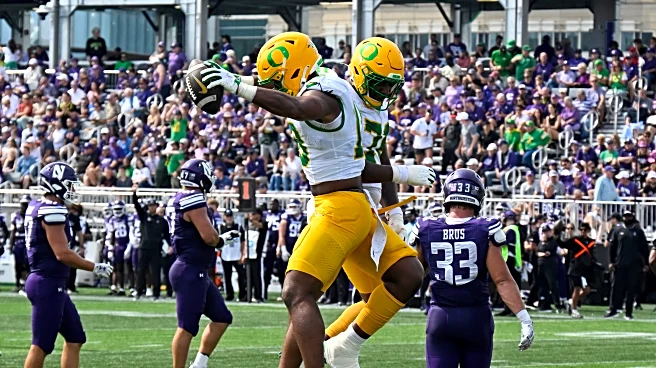 No. 4 Oregon cruises past Northwestern 34-14