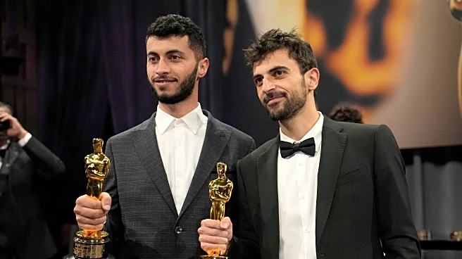 Oscar-winning Palestinian director Basel Adra says his home in West Bank raided by Israeli soldiers
