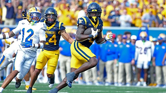 Edwards' short TD run in overtime leads West Virginia over Pittsburgh 31-24 in the Backyard Brawl