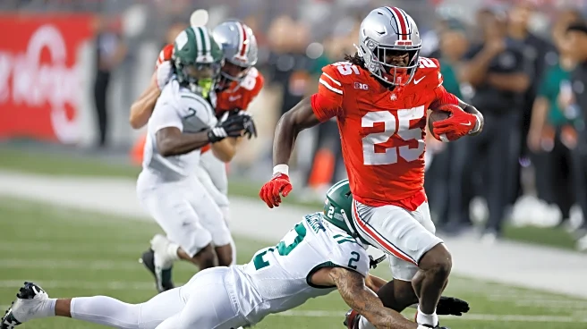 Sayin passes for 3 touchdowns, top-ranked Ohio State pulls away in second half to defeat Ohio 37-9