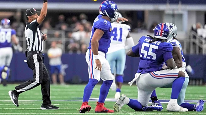 Penalty flags flying against Giants, who were set back 160 yards in overtime loss to Cowboys