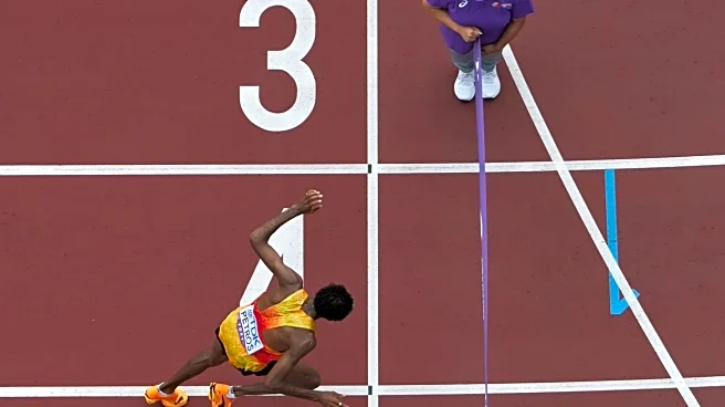 Marathon at worlds takes weird twists: a false start, a near wrong turn and, finally, a photo finish