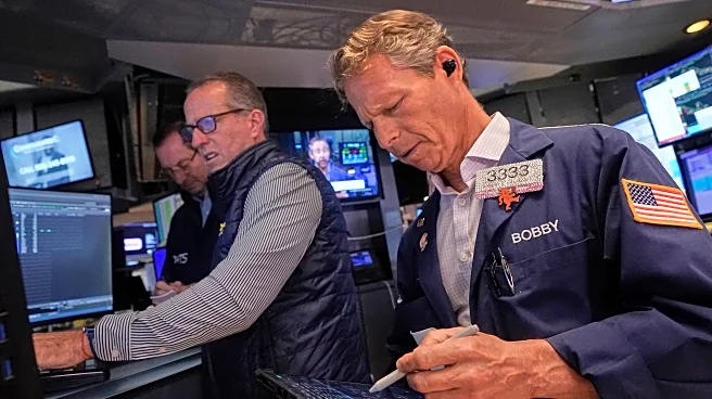 Wall Street ticks toward another record as Tesla vrooms higher