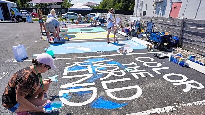 Parking spots used as colorful protest against Florida crackdown on rainbow crosswalks