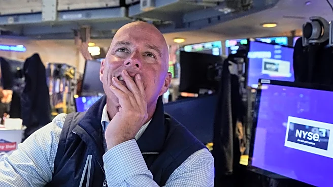 Wall Street ticks to more records as Tesla vrooms higher