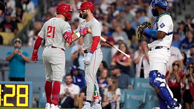Phillies clinch NL East title in wild 10th-inning comeback against Dodgers