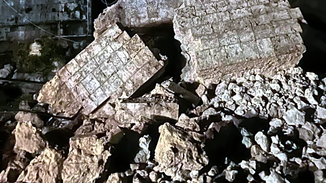 Strong earthquake in central Philippines damages building and sends people out of their homes
