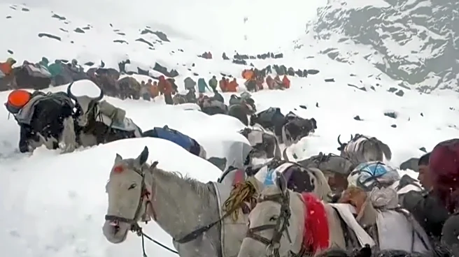 Snowstorms strand hikers in China and a South Korean climber dies in Nepal