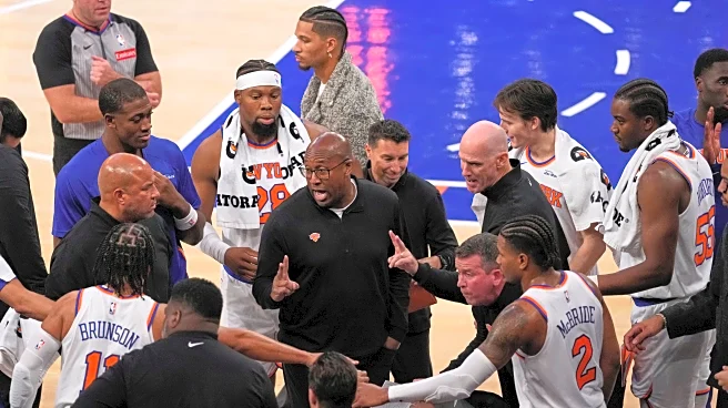 Mike Brown gets a win and a hug from Spike Lee in his first game as Knicks coach