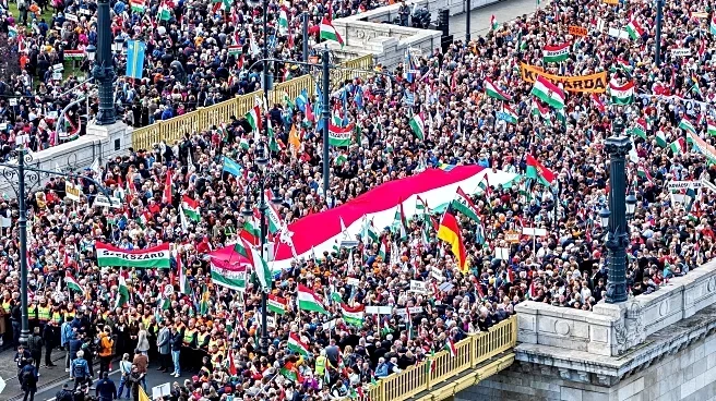 Hundreds of thousands of Hungarians attend rival rallies in Budapest as Orbán faces election test