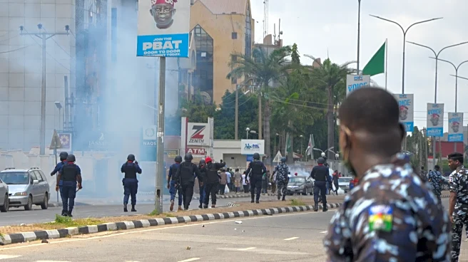 Nigeria's president replaces top security officials as he struggles to restore stability