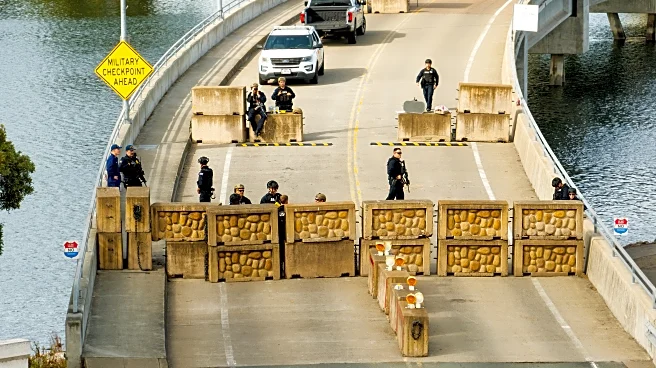 Shots fired, driver hurt and held after truck rams into Coast Guard base in California