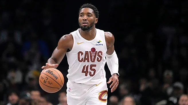 Mitchell scores 35 as Cavaliers outlast Nets 131-124