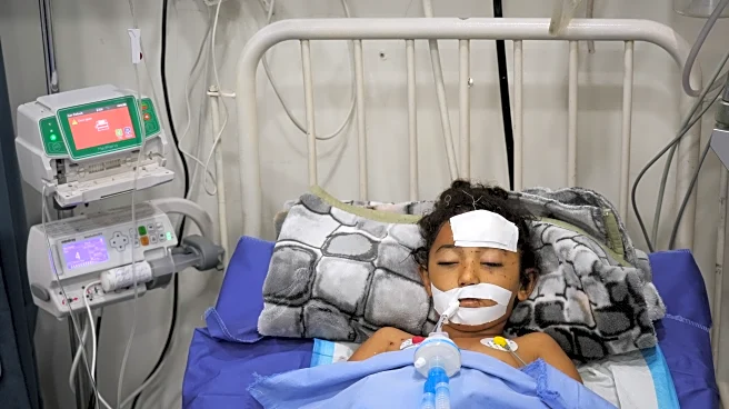 A bomb in Gaza's rubble wounds twins who thought it was a toy