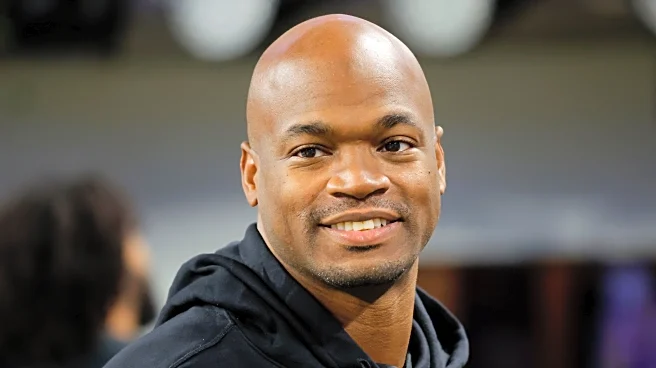 Former NFL star Adrian Peterson arrested in Houston suburb on DWI and gun charges