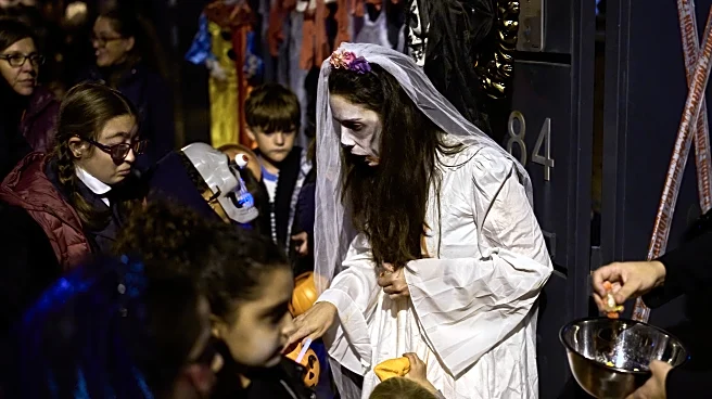 Halloween and a declining Christian tradition coexist on All Saints' Day in Spain