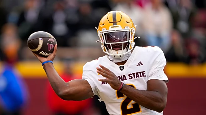 Sims sets Arizona State QB rushing record with 228 yards in 24-19 victory over Iowa State