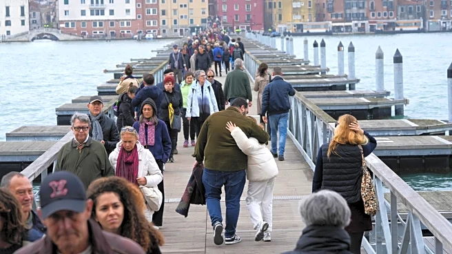 Venice revives a quarter-mile floating bridge to island cemetery for All Souls' Day mourners