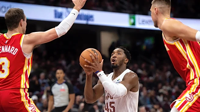 Donovan Mitchell scores 37 points as Cavaliers down Young-less Hawks 117-109