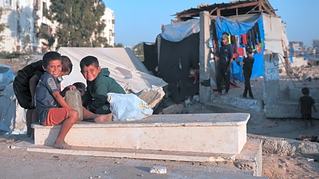 In Gaza cemeteries, some displaced Palestinians live among the dead