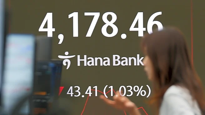 Asian shares trade lower after AI darlings prop up Wall Street