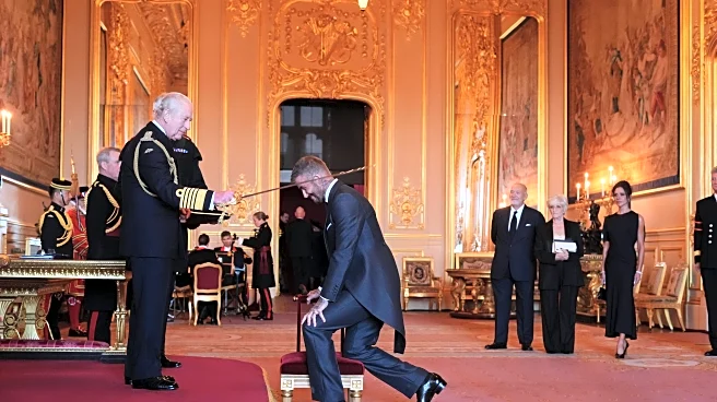 Bend a knee like Beckham: Soccer star is knighted by King Charles III