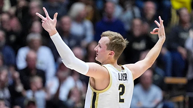Fletcher Loyer and Braden Smith team up to lead No. 1 Purdue to 82-51 rout of Evansville in opener