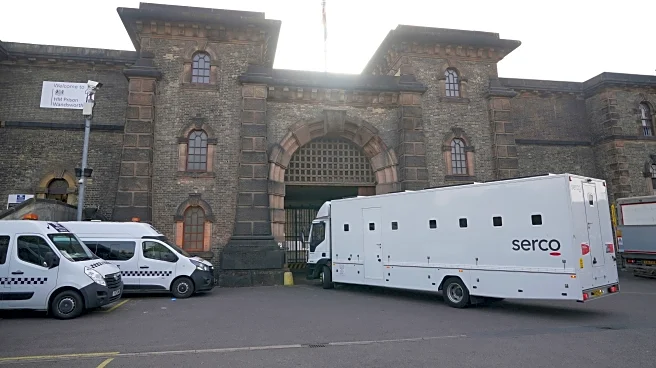 Mistakenly released UK prisoner turns himself in as search continues for second freed convict