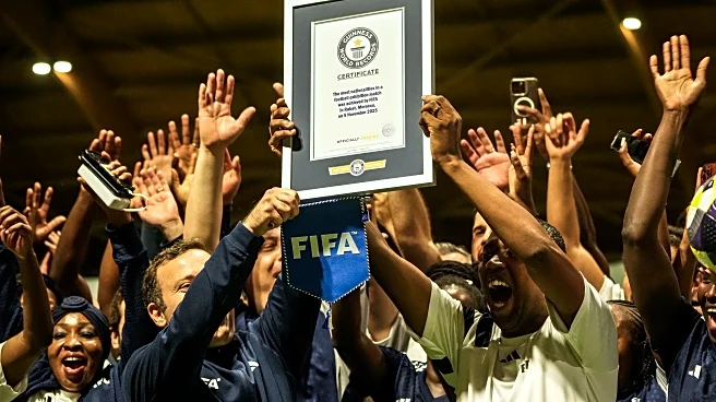 FIFA co-workers break Guinness World Record for most multinational soccer game