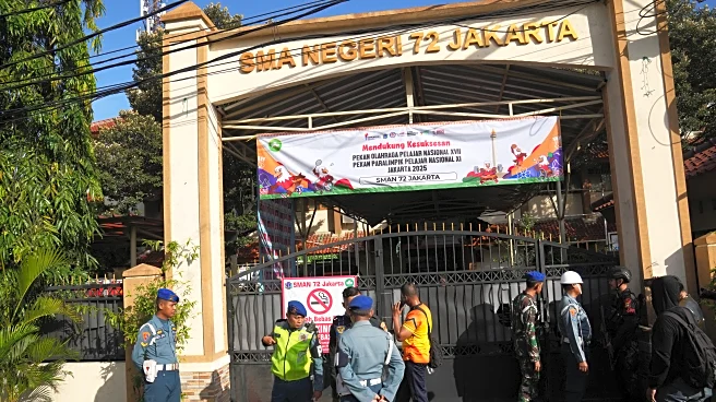 Multiple explosions shake a mosque in an Indonesian high school and injure 55