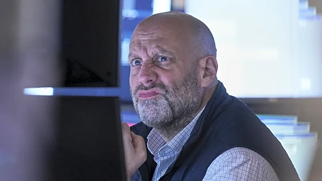 Stocks wind up mixed on Wall Street after spending most of the day in the red