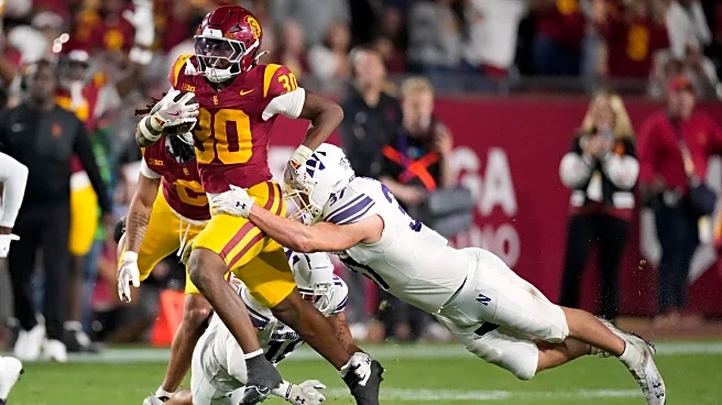 Lemon scores through air, on ground in No. 20 USC's 38-17 win over Northwestern